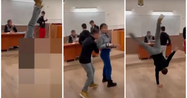 Profesor intins pe catedra si elevi care fac roata in sala de clasa, la un colegiu din Ramnicu Valcea
